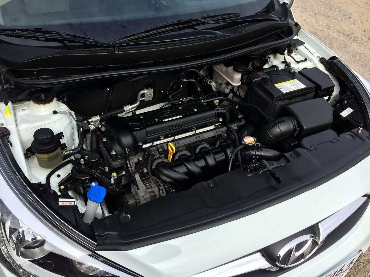 Какой двигатель на солярисе 1.6. Двигатель Hyundai Solaris 1.4. Hyundai Solaris 2013 двигатель. Хундай Солярис 1 4 двигатель. Hyundai Solaris 2014 двигатель.